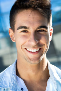 files/beautiful-young-man-looking-camera-home-garden.jpg