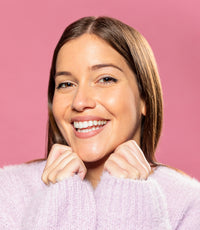 files/beautiful-young-woman-posing-with-pink-wallpaper-back.jpg